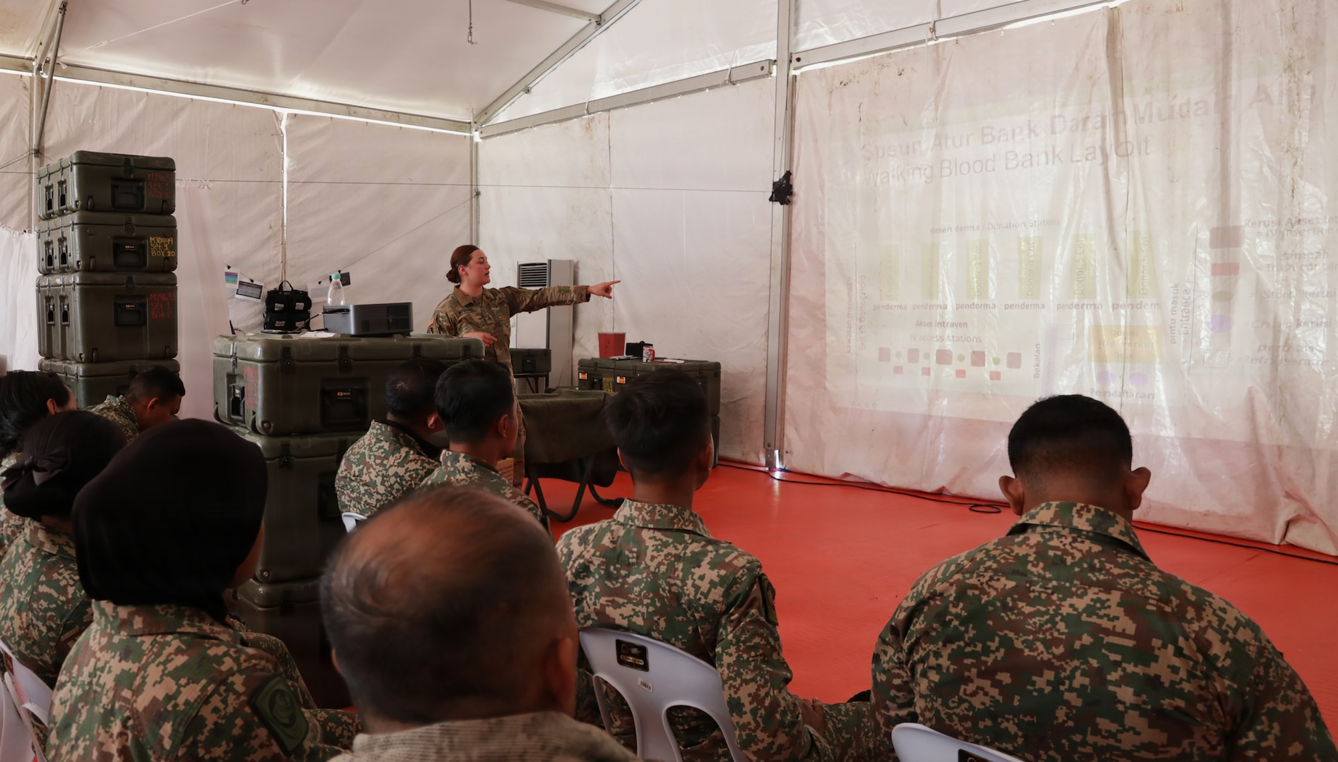 U.S. Army Staff Sgt. Anita Neuhas trains members of the Malaysian Army and Guam Army National Guard on mobile blood bank operations during Exercise Keris Strike near Kota Belud, Malaysia, July 17, 2026.