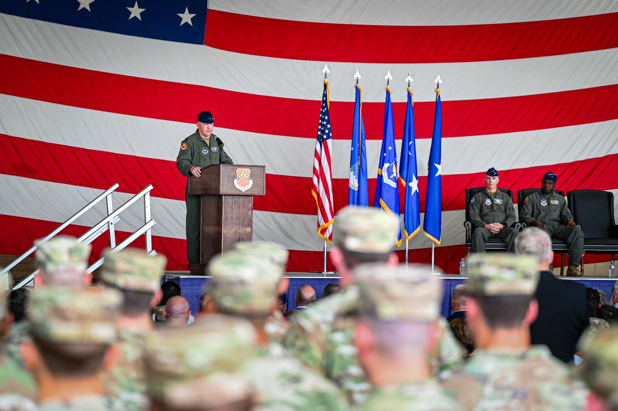 U.S. Air Force Col. Nicholas Ihde, 56th Fighter Wing commander, addresses the wing for the first time during a change of command and major command reassignment ceremony at Luke Air Force Base, Arizona, July 17, 2026.