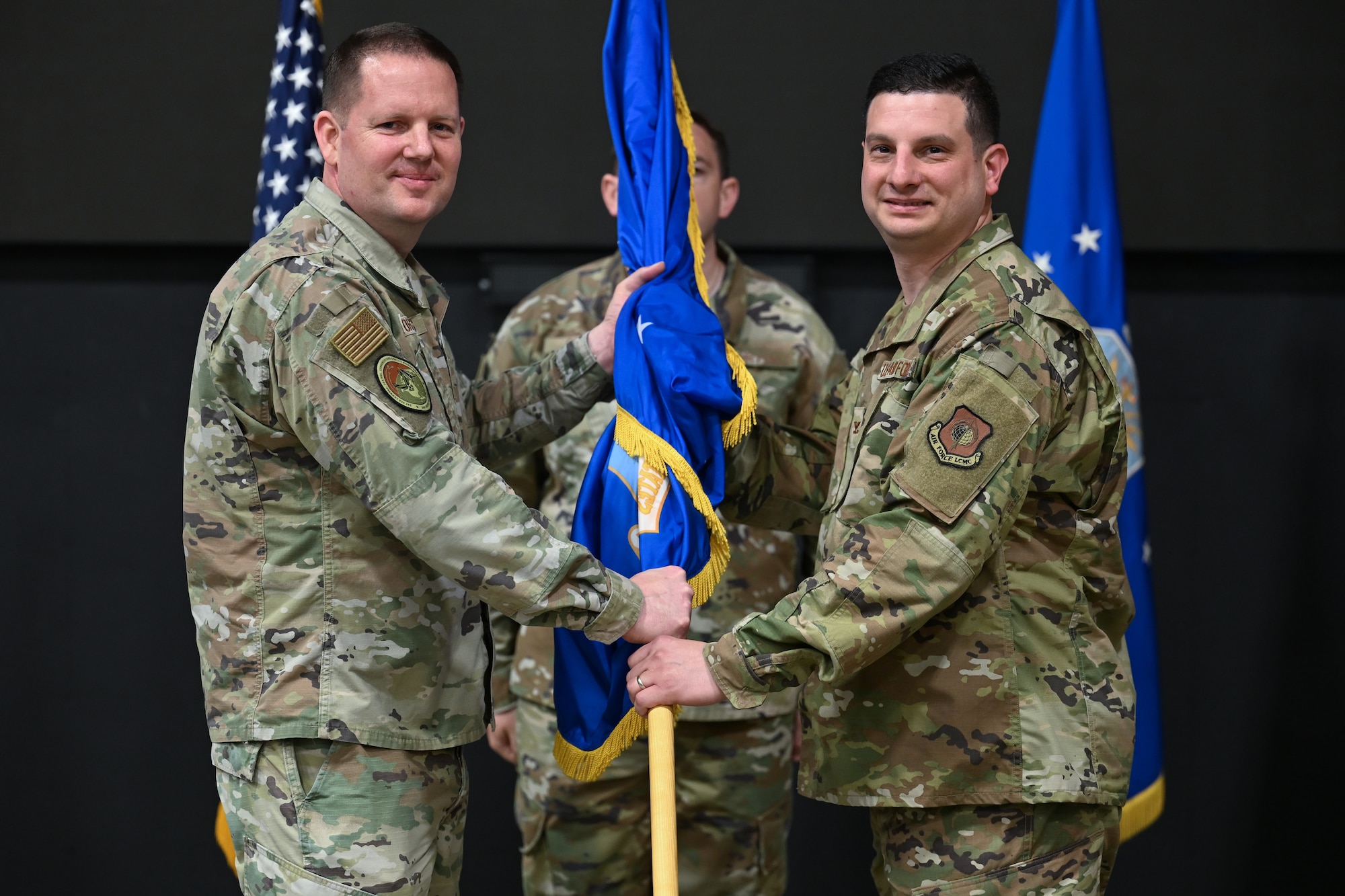 Brig. Gen. Jason Voorheis, left, appoints Col. Joseph Dolce as the Command and Control, Intelligence, Surveillance, and Reconnaissance division’s senior materiel leader during a ceremony, here, July 16. Voorheis is the Department of the Air Force Portfolio Acquisition Executive for Command, Control, Communications and Battle Management. C2ISR is a division within C3BM that provides acquisition and sustainment leadership supporting multiple operational weapons systems and mission-critical capabilities supporting the Air Force intelligence community. (Official Air Force photo by Richard Blumenstein).