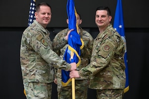 Brig. Gen. Jason Voorheis, left, appoints Col. Joseph Dolce as the Command and Control, Intelligence, Surveillance, and Reconnaissance division’s senior materiel leader during a ceremony, here, July 16. Voorheis is the Department of the Air Force Portfolio Acquisition Executive for Command, Control, Communications and Battle Management. C2ISR is a division within C3BM that provides acquisition and sustainment leadership supporting multiple operational weapons systems and mission-critical capabilities supporting the Air Force intelligence community. (Official Air Force photo by Richard Blumenstein).