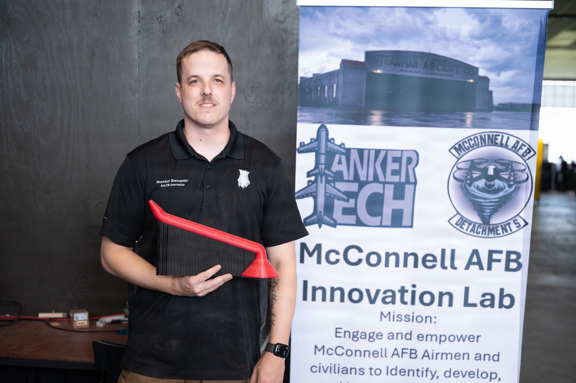 A thermoplastic polyurethane (TPU) fuel funnel is developed using 3-D printing by the Innovation Lab team at McConnell Air Force Base, Kansas, 17 July, 2026. The TPU funnel was created to increase servicing efficiency while doing maintenance on engine starters by maintenance professionals. (U.S. Air Force photo by Amn Daniel Obi.)