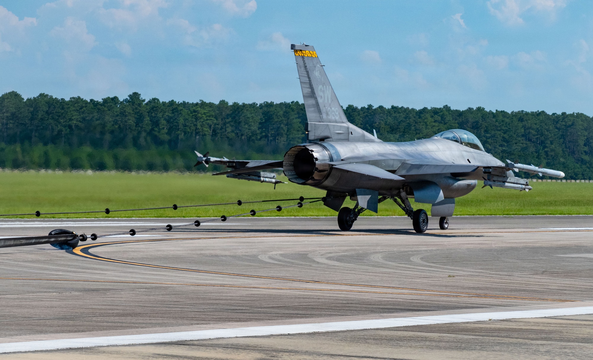 A rope pulls on a Fighter jet
