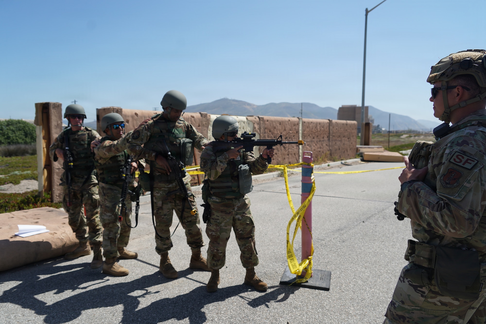 U.S. Air National Guardsmen assigned to the 146th Airlift Wing participate in Small Arms; Integrated Defense; Active Threat Response; during Ready Airman Training hosted at Naval Base Ventura County, Point Mugu, California, April 28, 2026. Ready Airman Training replaces the legacy expeditionary “just-in-time” deployment training, establishing a baseline to prepare every Airmen for deployed and home station contingencies outside of their single Air Force Specialty Code, creating a more lethal and resilient force. (U.S. Air National Guard photo by Tech. Sgt. Michelle Ulber)