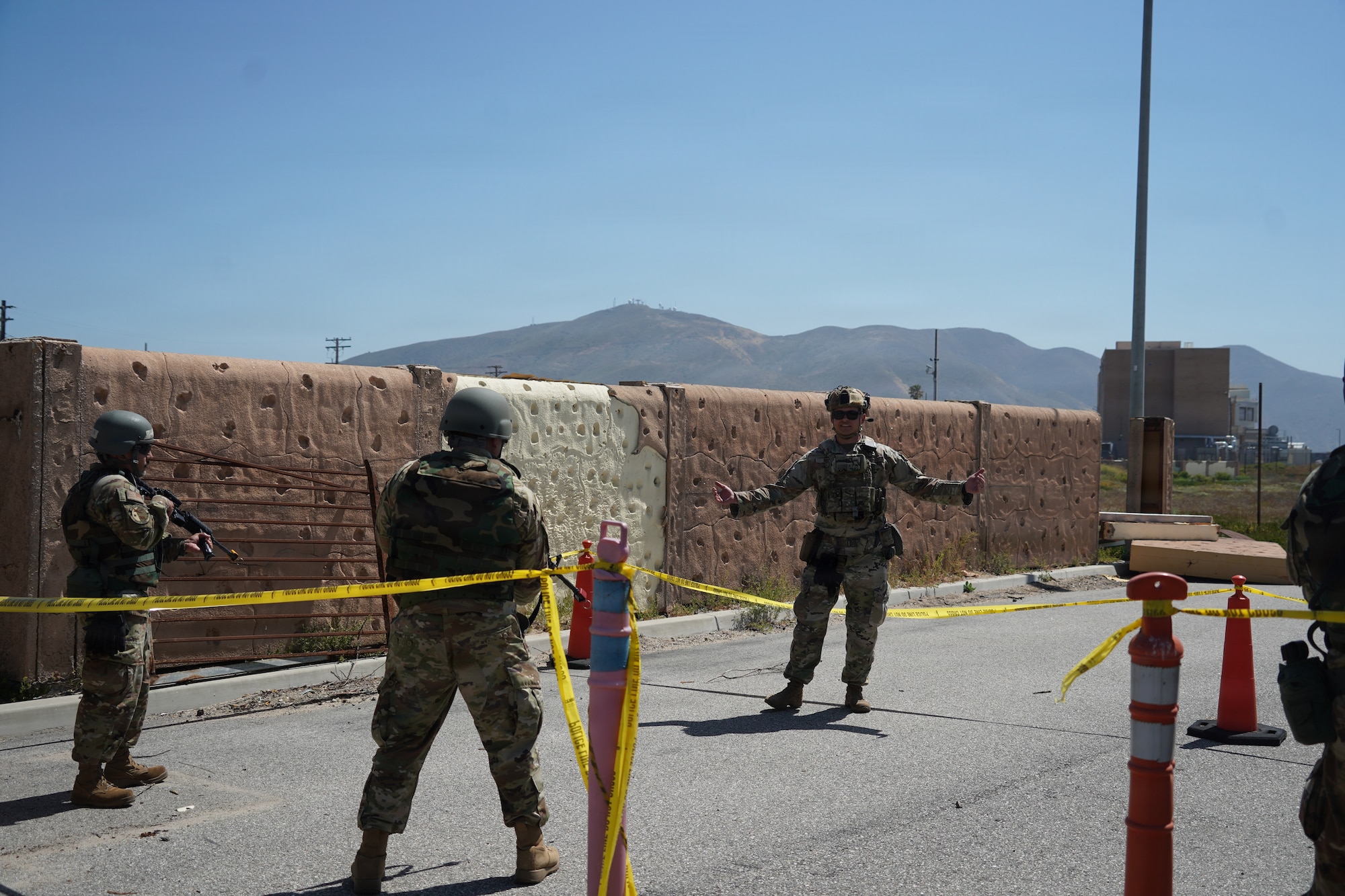 U.S. Air National Guardsmen assigned to the 146th Airlift Wing participate in Small Arms; Integrated Defense; Active Threat Response; during Ready Airman Training hosted at Naval Base Ventura County, Point Mugu, California, April 28, 2026. Ready Airman Training replaces the legacy expeditionary “just-in-time” deployment training, establishing a baseline to prepare every Airmen for deployed and home station contingencies outside of their single Air Force Specialty Code, creating a more lethal and resilient force. (U.S. Air National Guard photo by Tech. Sgt. Michelle Ulber)