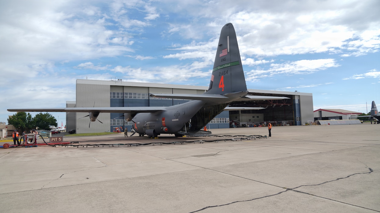 Airmen from the 146th Airlift Wing, 152nd Airlift Wing and the 302nd Airlift Wing train alongside CAL FIRE ground crews during their annual Modular Airborne Firefighting System (MAFFS) recertification training at McClellan Air Tanker Base, Sacramento, Calif. on April 20, 2026. The MAFFS  is a roll on and off system that enables a military C-130 aircraft to become a firefighting air tanker that can spread thousands of gallons of retardant along a quarter mile line, aiding ground crews to suppress wildfires. The training ensures that aircrews and support personnel remain qualified to operate the MAFFS system and fly into hazardous fire areas at any time of year. (U.S. Air National Guard photos by Tech. Sgt. Michelle Ulber)