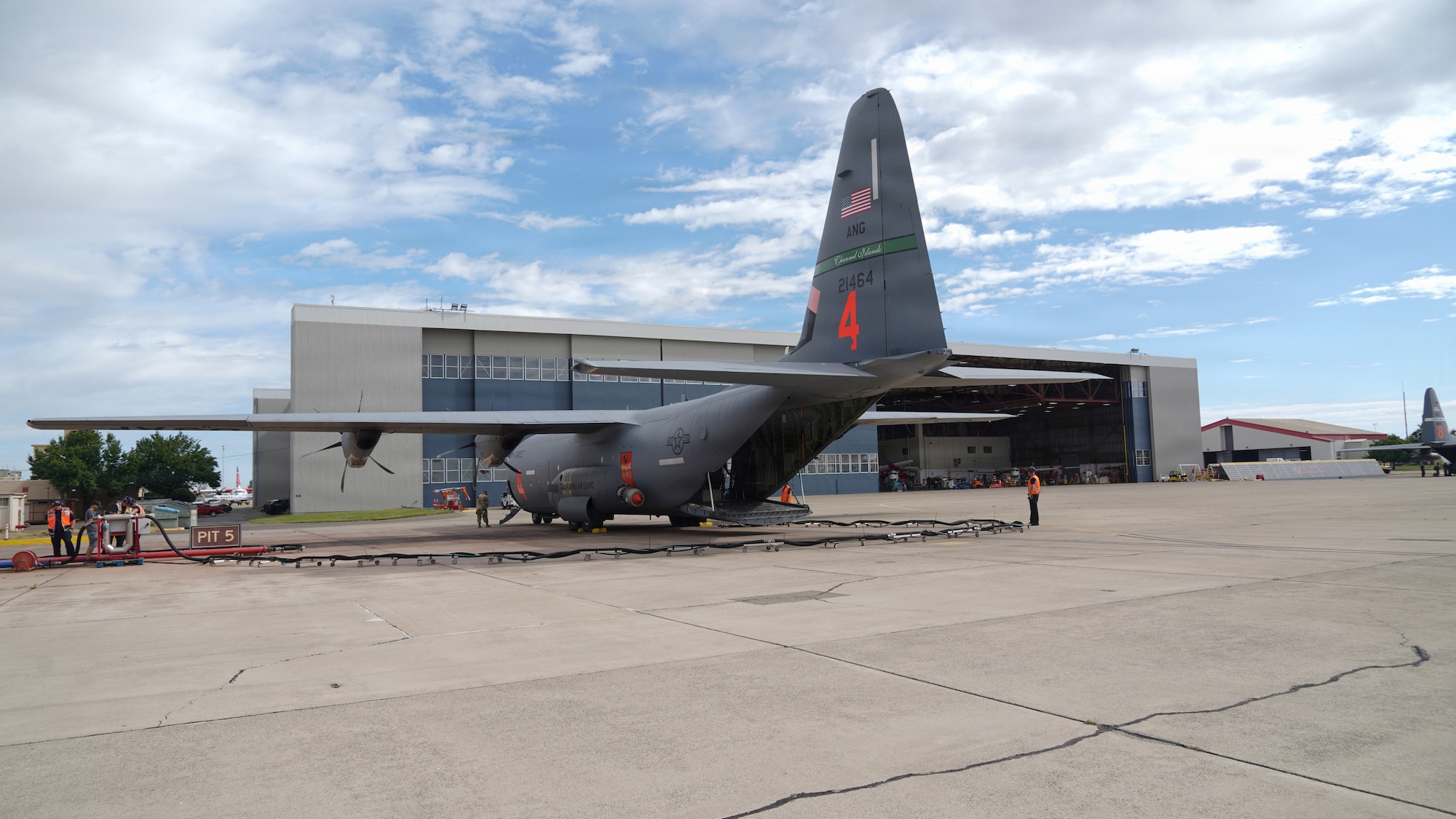 Airmen from the 146th Airlift Wing, 152nd Airlift Wing and the 302nd Airlift Wing train alongside CAL FIRE ground crews during their annual Modular Airborne Firefighting System (MAFFS) recertification training at McClellan Air Tanker Base, Sacramento, Calif. on April 20, 2026. The MAFFS  is a roll on and off system that enables a military C-130 aircraft to become a firefighting air tanker that can spread thousands of gallons of retardant along a quarter mile line, aiding ground crews to suppress wildfires. The training ensures that aircrews and support personnel remain qualified to operate the MAFFS system and fly into hazardous fire areas at any time of year. (U.S. Air National Guard photos by Tech. Sgt. Michelle Ulber)