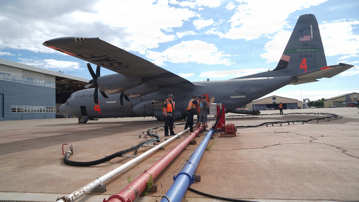 Airmen from the 146th Airlift Wing, 152nd Airlift Wing and the 302nd Airlift Wing train alongside CAL FIRE ground crews during their annual Modular Airborne Firefighting System (MAFFS) recertification training at McClellan Air Tanker Base, Sacramento, Calif. on April 20, 2026. The MAFFS  is a roll on and off system that enables a military C-130 aircraft to become a firefighting air tanker that can spread thousands of gallons of retardant along a quarter mile line, aiding ground crews to suppress wildfires. The training ensures that aircrews and support personnel remain qualified to operate the MAFFS system and fly into hazardous fire areas at any time of year. (U.S. Air National Guard photos by Tech. Sgt. Michelle Ulber)