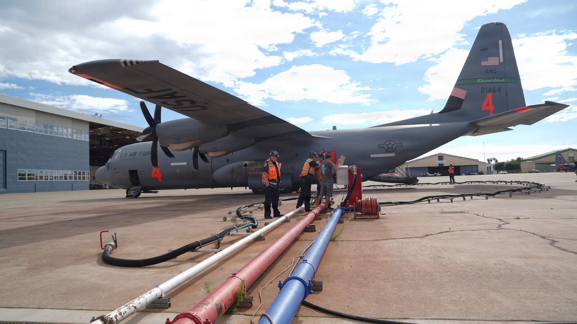 Airmen from the 146th Airlift Wing, 152nd Airlift Wing and the 302nd Airlift Wing train alongside CAL FIRE ground crews during their annual Modular Airborne Firefighting System (MAFFS) recertification training at McClellan Air Tanker Base, Sacramento, Calif. on April 20, 2026. The MAFFS  is a roll on and off system that enables a military C-130 aircraft to become a firefighting air tanker that can spread thousands of gallons of retardant along a quarter mile line, aiding ground crews to suppress wildfires. The training ensures that aircrews and support personnel remain qualified to operate the MAFFS system and fly into hazardous fire areas at any time of year. (U.S. Air National Guard photos by Tech. Sgt. Michelle Ulber)