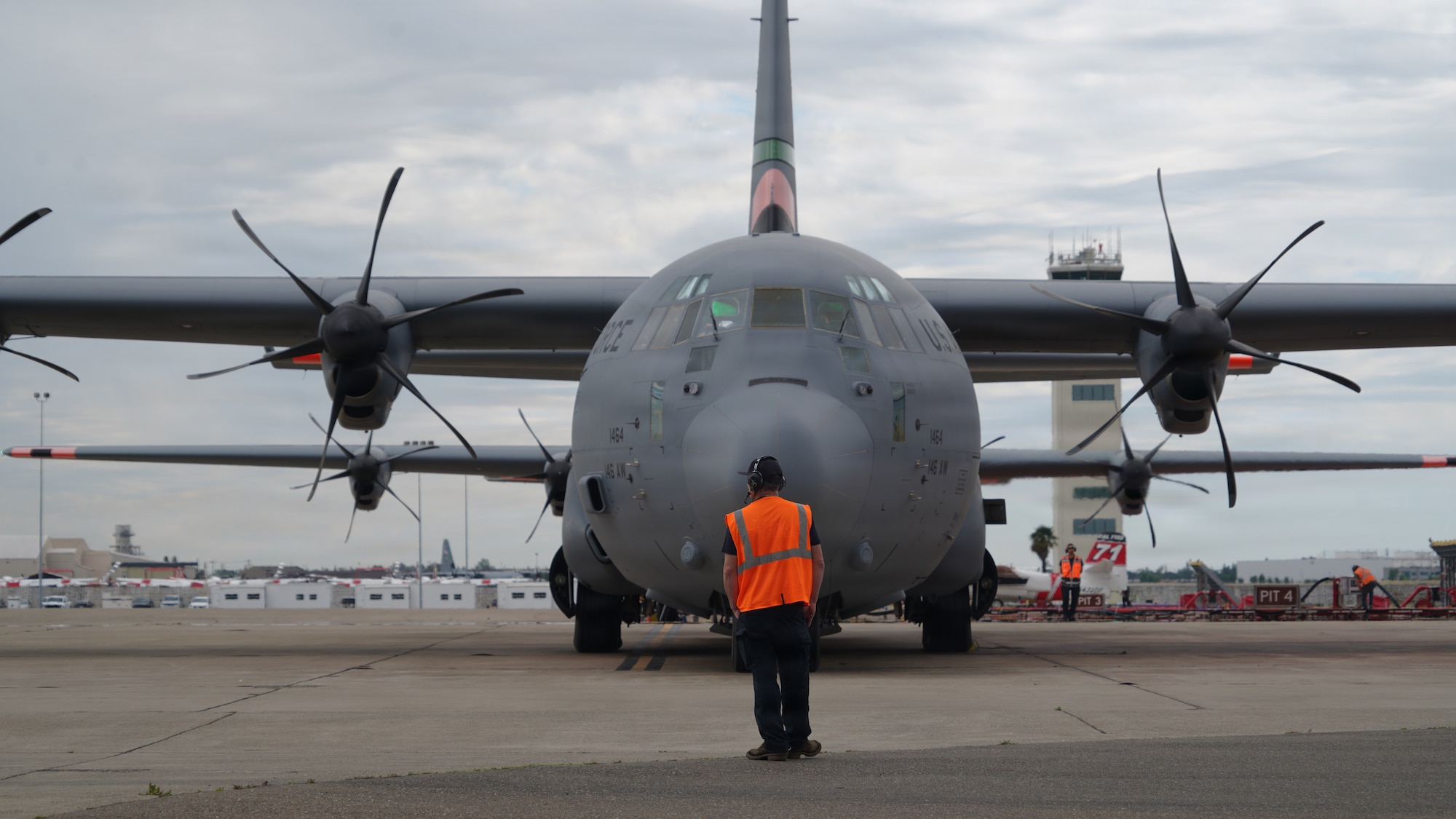 Airmen from the 146th Airlift Wing, 152nd Airlift Wing and the 302nd Airlift Wing train alongside CAL FIRE ground crews during their annual Modular Airborne Firefighting System (MAFFS) recertification training at McClellan Air Tanker Base, Sacramento, Calif. on April 20, 2026. The MAFFS  is a roll on and off system that enables a military C-130 aircraft to become a firefighting air tanker that can spread thousands of gallons of retardant along a quarter mile line, aiding ground crews to suppress wildfires. The training ensures that aircrews and support personnel remain qualified to operate the MAFFS system and fly into hazardous fire areas at any time of year. (U.S. Air National Guard photos by Tech. Sgt. Michelle Ulber)