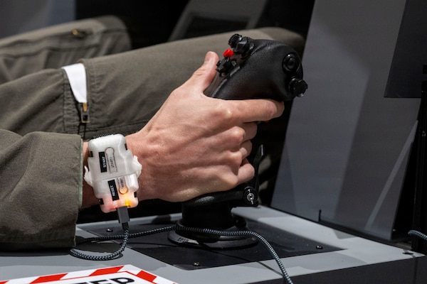 U.S. Air Force Capt. Daniel Lee, 13th Fighter Squadron F-35 pilot, uses an F-35 Emulated Non-Operational Flight Program Interoperability Experience simulator in support of VALIANT SHIELD 2026 at Misawa Air Base, Japan, June 30, 2026.