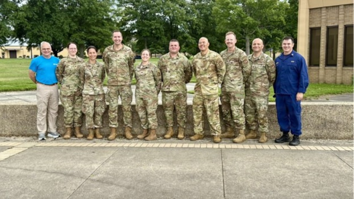 Members of the Center for Sustainment of Trauma and Readiness Skills (C-STARS) Omaha pose for a group photo during Ebola response training, June 5, 2026, Omaha Neb. As the Ebola outbreak continues to challenge public health officials in the Democratic Republic of Congo, medical experts from the Air Force Research Laboratory’s 711th Human Performance Wing provided critical pre-deployment training for U.S. Public Health Service (USPHS) personnel deploying in support of Operation United Assistance 2. Pictured from left are Dr. James Lawler, University of Nebraska Medical Center; Maj. Kelly Mittal, C-STARS Omaha; Col. Elizabeth Schnabelt, director, C-STARS Omaha; Maj. Owen Caron, deputy director, C-STARS Omaha; Lt. Col. Stefanie Till, C-STARS Omaha; Tech. Sgt. Brandon Powers, C-STARS Omaha; Master Sgt. Jerald Calip, superintendent, C-STARS Omaha; Maj. Brendan Cleary, medical director, C-STARS Omaha; Maj. Jeremy Deep, U.S. Air Force School of Aerospace Medicine; and Capt. Bryan Christensen, CDC. 
Photo provided by Maj Owen Caron, Deputy Director, C-STARS Omaha 
 (U.S. Air Force photo courtesy photo)
