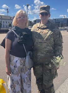 U.S. Army Staff Sgt. Bailey Wright, assigned to Headquarters and Headquarters Company, 376th Brigade Engineer Battalion, 2nd Infantry Brigade Combat Team, Pennsylvania Army National Guard, poses for a photo with Reek Vinkel, a registered nurse and coordinator of the East Tallinn Women's Clinic Milk Bank, during Exercise Vigorous Warrior 2026 in Estonia. Wright donated expressed breast milk to the clinic's milk bank while supporting the NATO exercise. The clinic operates Estonia's only breast milk bank. (Courtesy photo)