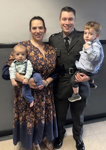 U.S. Army Staff Sgt. Bailey Wright, assigned to Headquarters and Headquarters Company, 376th Brigade Engineer Battalion, 2nd Infantry Brigade Combat Team, Pennsylvania Army National Guard, poses for a family photo with her husband and their two sons on May 22, 2026. Wright has served in the Pennsylvania Army National Guard for eight years while balancing military service and motherhood. (Courtesy photo)