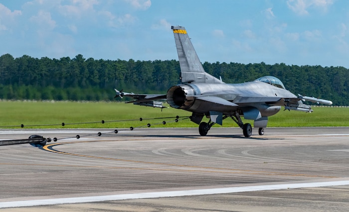 A rope pulls on a Fighter jet