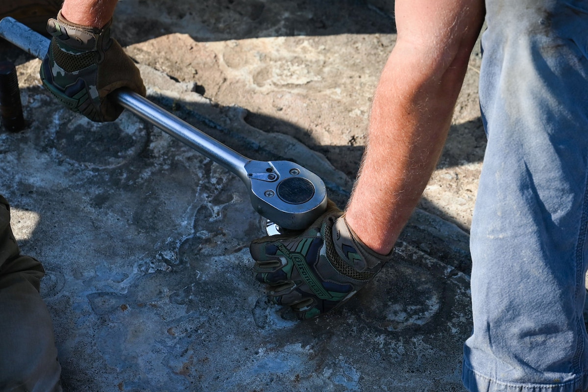 A bolt being tightened