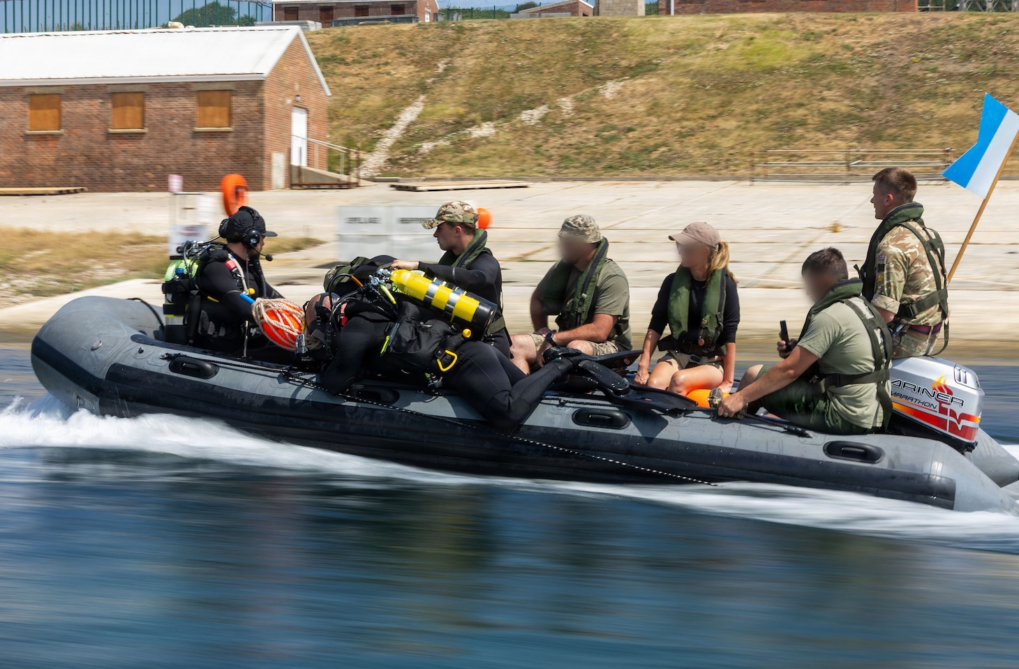 Divers assigned to the British Army, 22 Engineer Regiment dive team, and divers assigned to the British Royal Navy, 33 Explosive Ordnance Disposal and Search Regiment dive team, conduct a diving training with members of the Ukrainian Navy Explosive Ordnance Disposal team on a Rigid-Hull Inflatable Boat at Chisel Beach during exercise Sea Breeze 26-2 in Portland, England, July 15, 2026