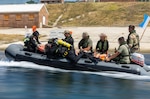 Divers assigned to the British Army, 22 Engineer Regiment dive team, and divers assigned to the British Royal Navy, 33 Explosive Ordnance Disposal and Search Regiment dive team, conduct a diving training with members of the Ukrainian Navy Explosive Ordnance Disposal team on a Rigid-Hull Inflatable Boat at Chisel Beach during exercise Sea Breeze 26-2 in Portland, England, July 15, 2026