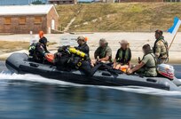 Divers assigned to the British Army, 22 Engineer Regiment dive team, and divers assigned to the British Royal Navy, 33 Explosive Ordnance Disposal and Search Regiment dive team, conduct a diving training with members of the Ukrainian Navy Explosive Ordnance Disposal team on a Rigid-Hull Inflatable Boat at Chisel Beach during exercise Sea Breeze 26-2 in Portland, England, July 15, 2026