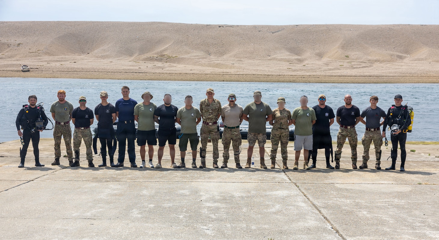 British Army, 22 Engineer Regiment dive team; British Royal Navy, 33 Explosive Ordnance Disposal and Search Regiment dive team; and members of the Ukrainian Navy Explosive Ordnance Disposal dive team; pose for a group photo after a diving training at Chisel Beach during exercise Sea Breeze 26-2 in Portland, United Kingdom, July 15, 2026.