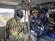 Idaho Army National Guard Staff Sgt. Brad Stock and Boise Fire Department Cpt. Ryan Yates travel to Mount Idaho in a UH-60 Black Hawk to conduct a search and rescue mission on the state's seventh highest peak, July 18, 2026