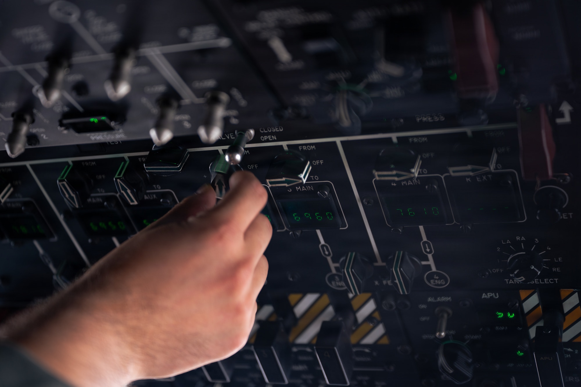 Airman distributes fuel on aircraft