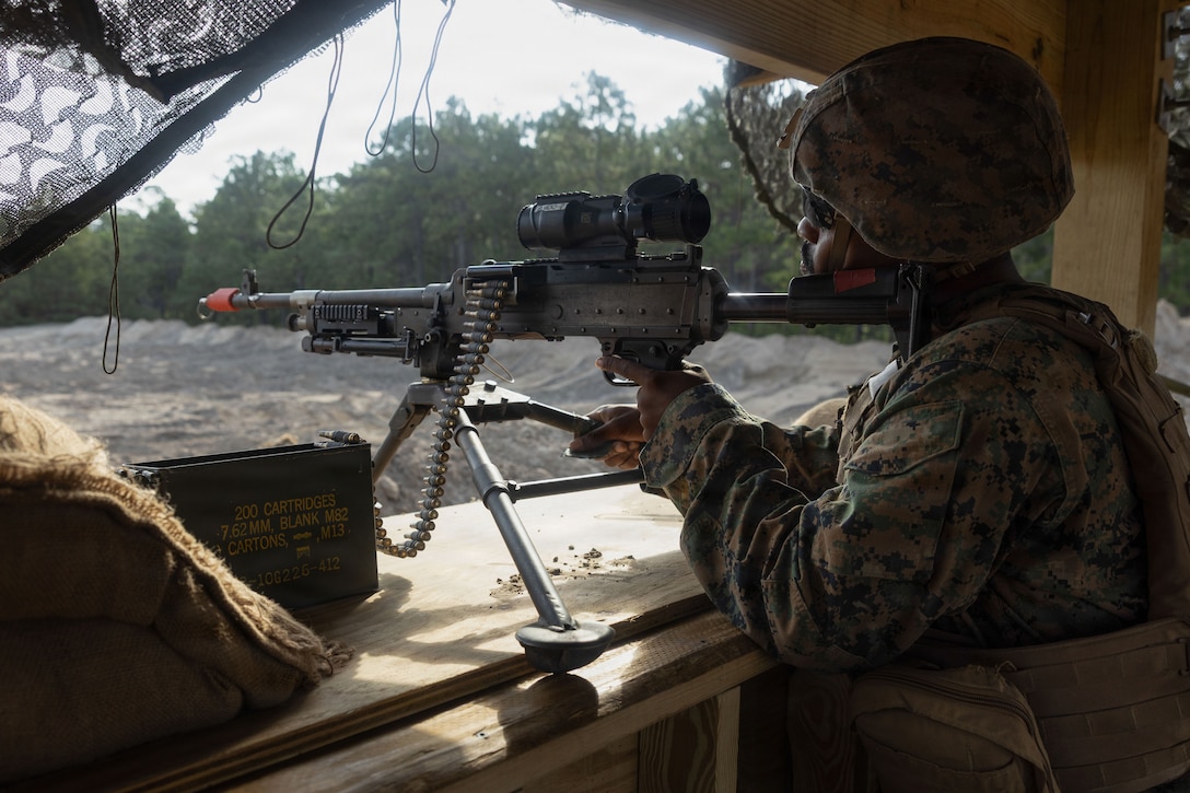 U.S. Marine Corps Lance Cpl. Kahlel Kirkland, an engineer assistant with 8th Engineer Support Battalion, Combat Logistics Regiment 27, 2nd Marine Logistics Group, provides security for a bulk fuel site at Marine Corps Base Camp Lejeune, North Carolina, July 20, 2026. 8th ESB constructed and established an Amphibious Assault Fuel System and cantonment site to support the II Marine Expeditionary Force. Kirkland is a native of New Jersey. (U.S. Marine Corps photo by Lance Cpl. Isabelle Veillette)