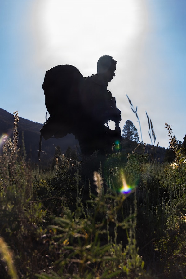 A U.S. Marine with Headquarters and Service Company, 3rd Battalion, 25th Marine Regiment, 4th Marine Division, posts for security during Mountain Training Exercise (MTX) 26-3 at Marine Corps Mountain Warfare Training Center, Bridgeport, California, July 15, 2026. MTX is an annual two-week training evolution that is designed to strengthen unit cohesion and prepare the battalion for rapid mobilization in support of future global operations. (U.S. Marine Corps photo by Cpl. Orion Stpierre)