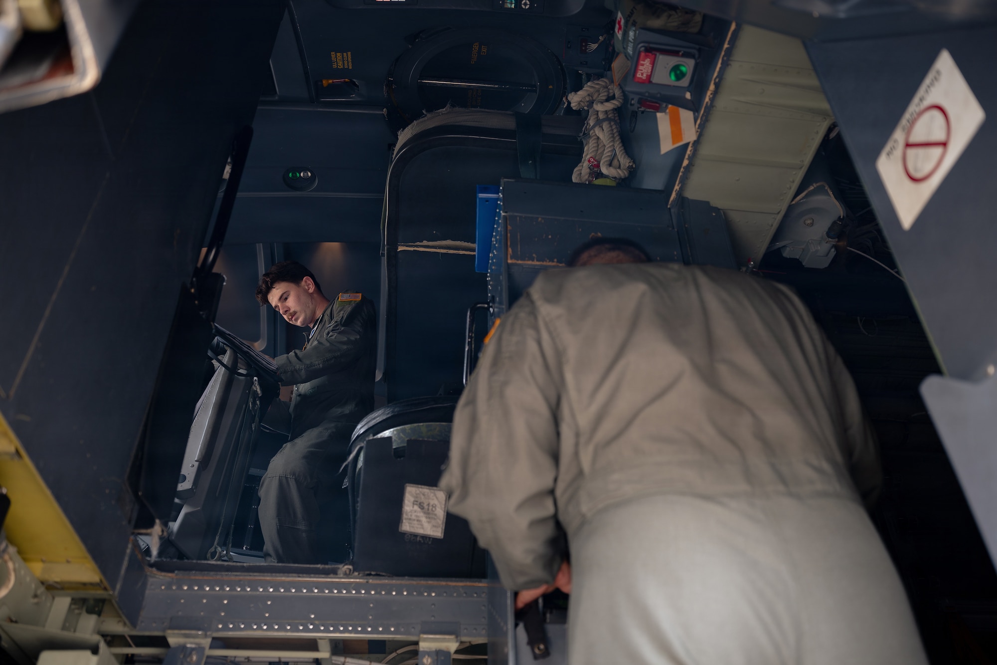 Airman goes over aircraft paperwork