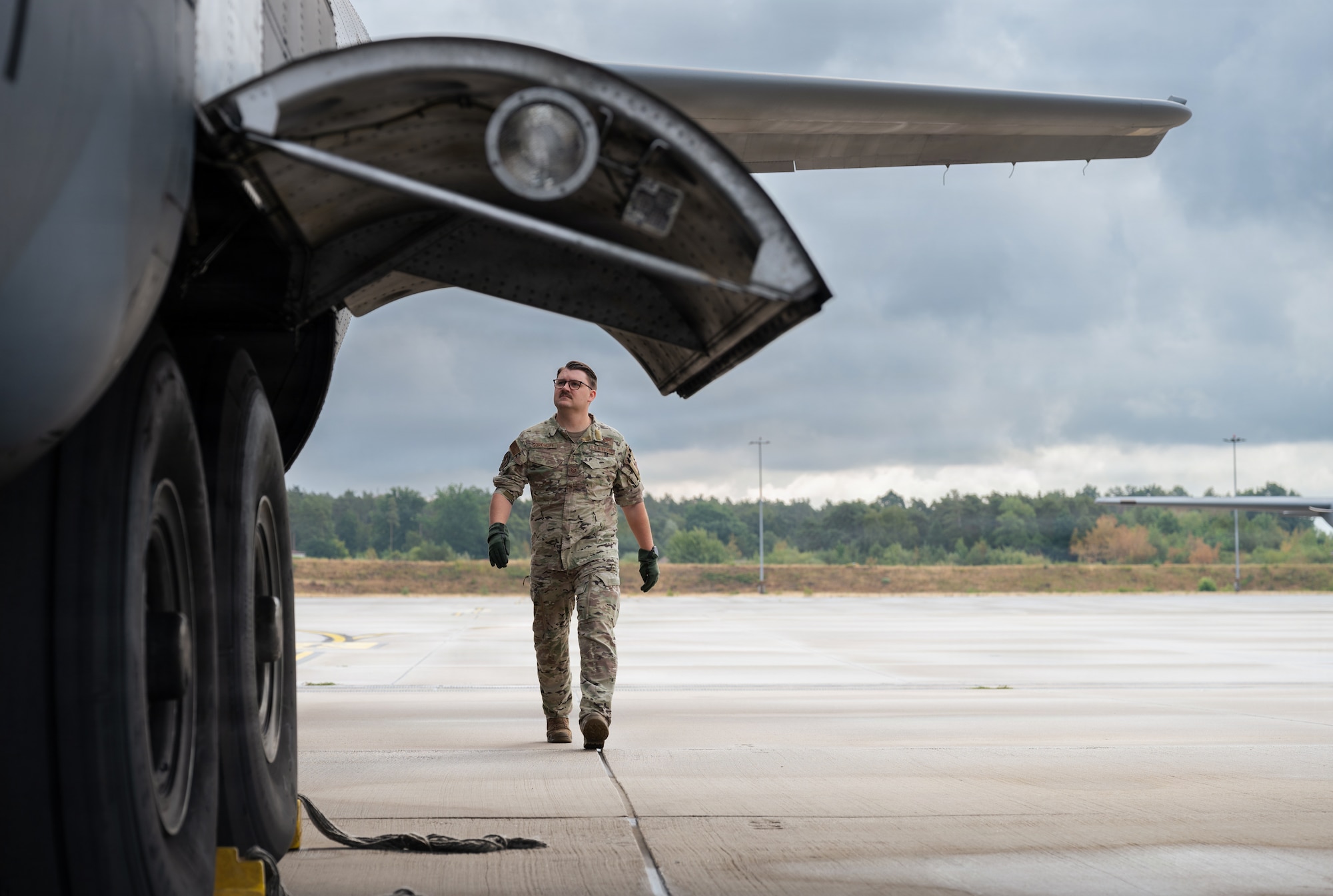 Airman inspects an aircraft