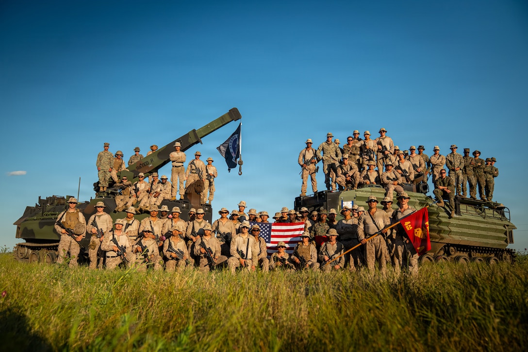 U.S. Marines with Company A, 4th Assault Amphibian Battalion, 4th Marine Division, stand together during the closing ceremony of Sea Breeze 26 at Babadag Training Area, Romania, June 16, 2026. Sea Breeze 26 is an annual exercise co-sponsored by U.S. Naval Forces Europe and Africa and U.S. Marine Corps Forces Europe and Africa, designed to develop interoperability of maritime and ground forces in the Black Sea Region through combined NATO deliberate planning, integration, and command and control of Marine amphibious forces. (U.S. Marine Corps photo by Sgt. Noah Masog)