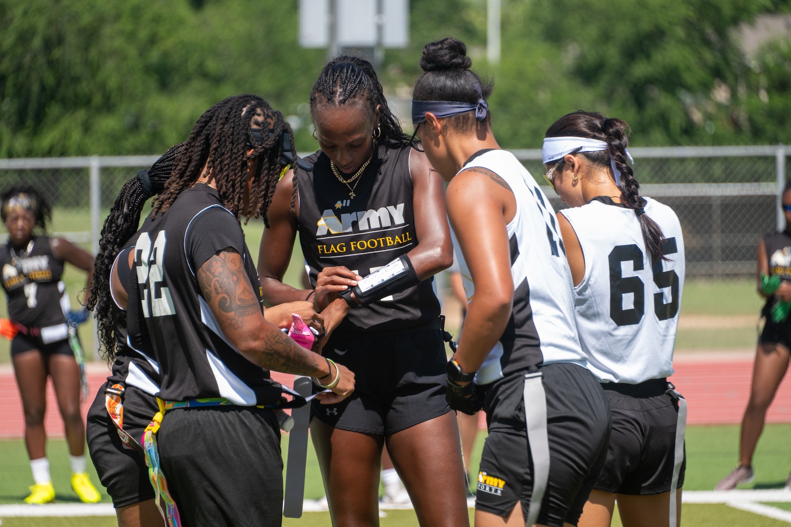 Women Flag Football players from the Army practice in preparation for the inaugural Armed Forces Flag Football Championship held at Cole Stadium at Joint Base San Antonio-Fort Sam Houston, Texas from 22-25 August 2026. Teams from the Army, Marine Corps, Navy (with Coast Guard players) and the Air Force (with Space Force players) battle it out for gold.