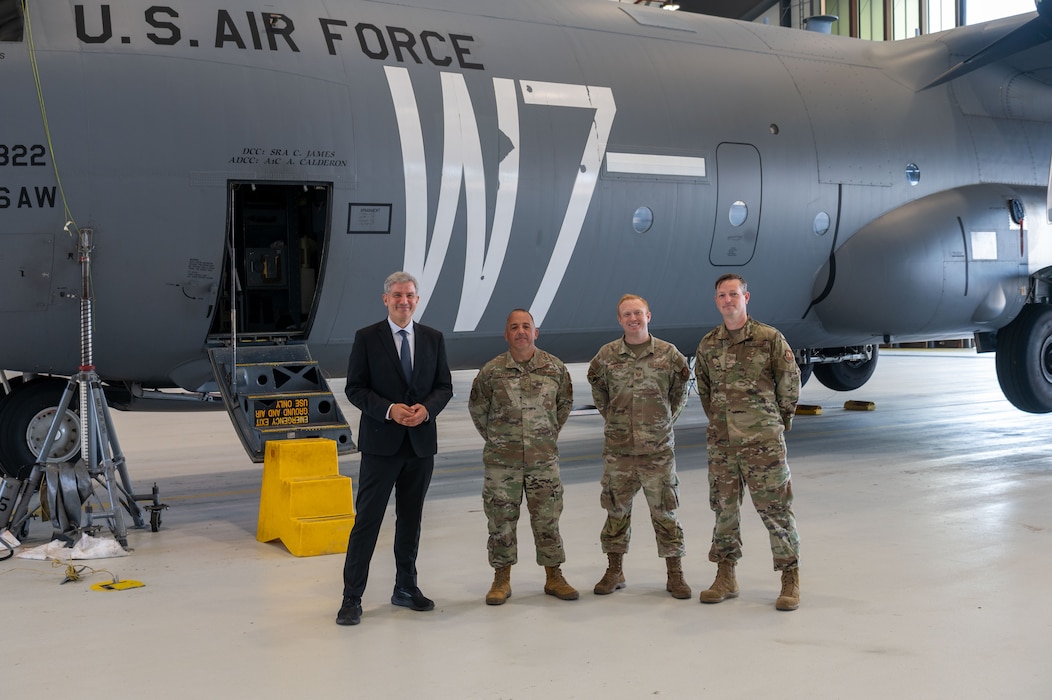 Metin Hakverdi, German Coordinator of Transatlantic Cooperation, left, receives a mission brief from U.S. Air Force Master Sgt. Devon Bullock, 37th Aircraft Maintenance flight chief.