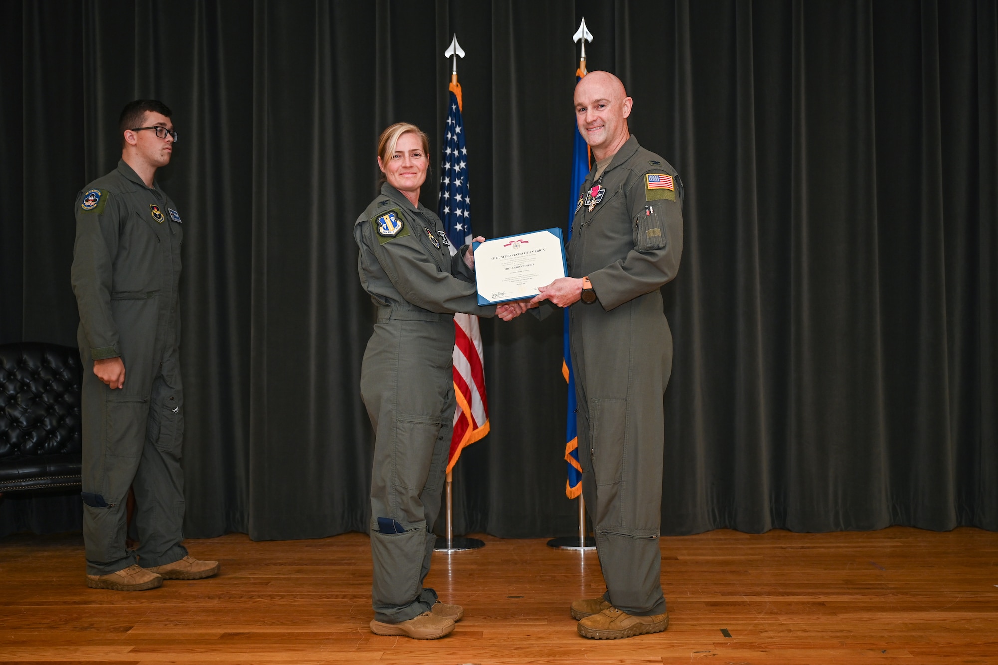 A man receives an award.