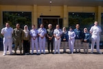 Leaders of Pacific Partnership 2026 (PP26), U.S. Consulate Medan, U.S. Embassy Jakarta, Indonesian National Armed Forces (Tentara Nasional Indonesia), and members of Radio Republik Indonesia Sibolga pose for a group photo during the PP26 Indonesia mission stop opening ceremony in Sibolga, Indonesia, July 21, 2026. Now in its 22nd iteration, the Pacific Partnership series is the largest annual multinational humanitarian assistance and disaster management preparedness mission conducted in the region. Pacific Partnership works collaboratively with host and partner nations to enhance regional interoperability and disaster response capabilities, increase security in the region, and foster new and enduring friendships in the Indo-Pacific. (U.S. Navy photo by Mass Communication Specialist 2nd Class Anthony Robledo)