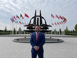Giovanni Morales, business support branch chief for the Business Support Branch, Defense Logistics Agency Troop Support, and a Department of War Executive Leadership Development Program participant, stands outside the NATO Headquarters in Brussels, Belgium. Morales visited NATO as part of a rigorous 10-month ELDP travel schedule designed to prepare future defense executives for leadership roles. The global training allowed Morales to engage with international ambassadors and understand how logistics support agreements impact frontline military operations.