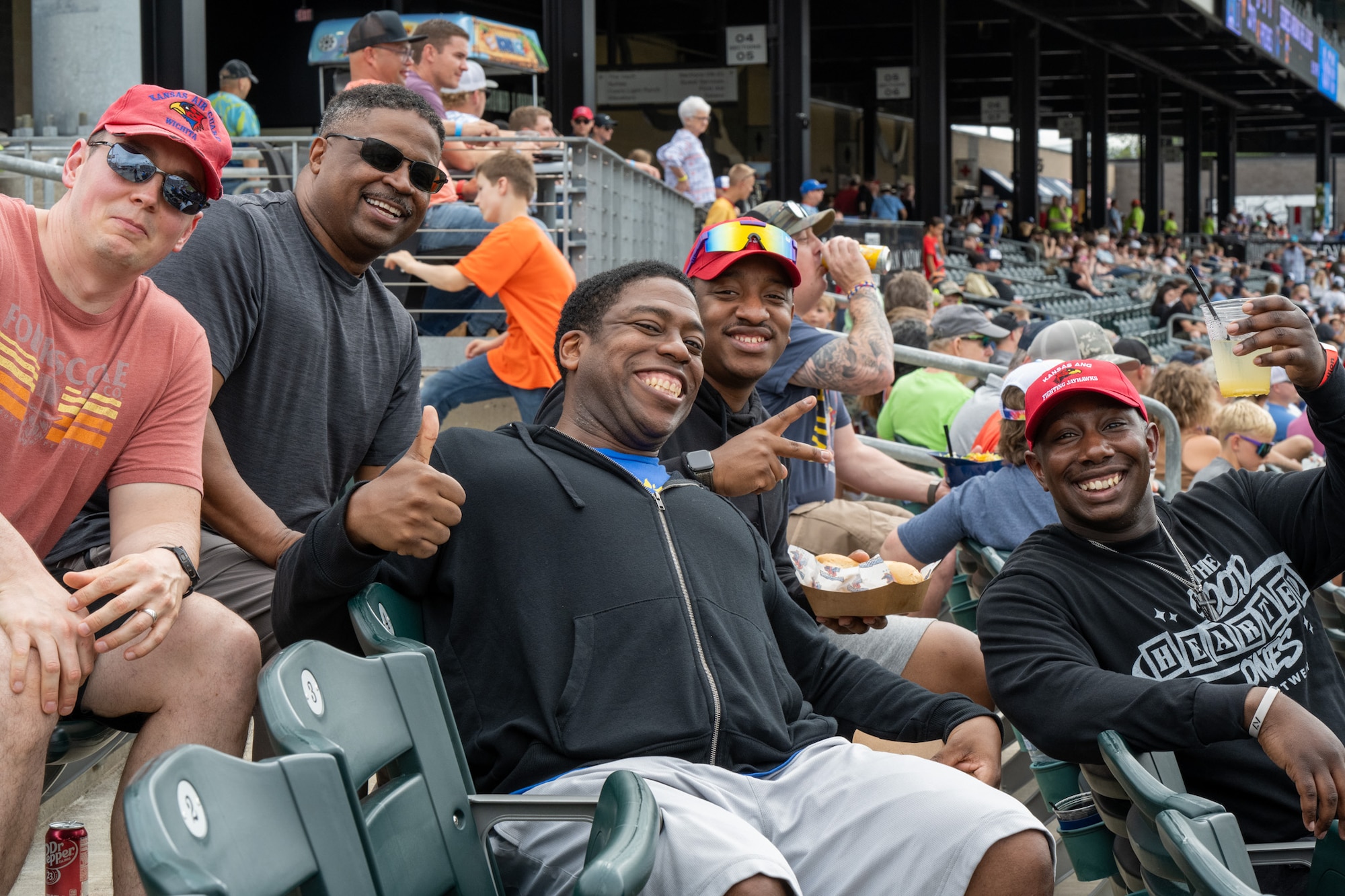 Service members, family and friends of the 184th Wing enjoy family day at the ballpark at Equity Bank Park, Wichita, Kan., June 6, 2026. The families gathered to watch the baseball game and participate in games and festivities hosted by Wind Surge and the 184th Wing. (U.S. Air National Guard photo by Airman 1st Class Darigan Brown)