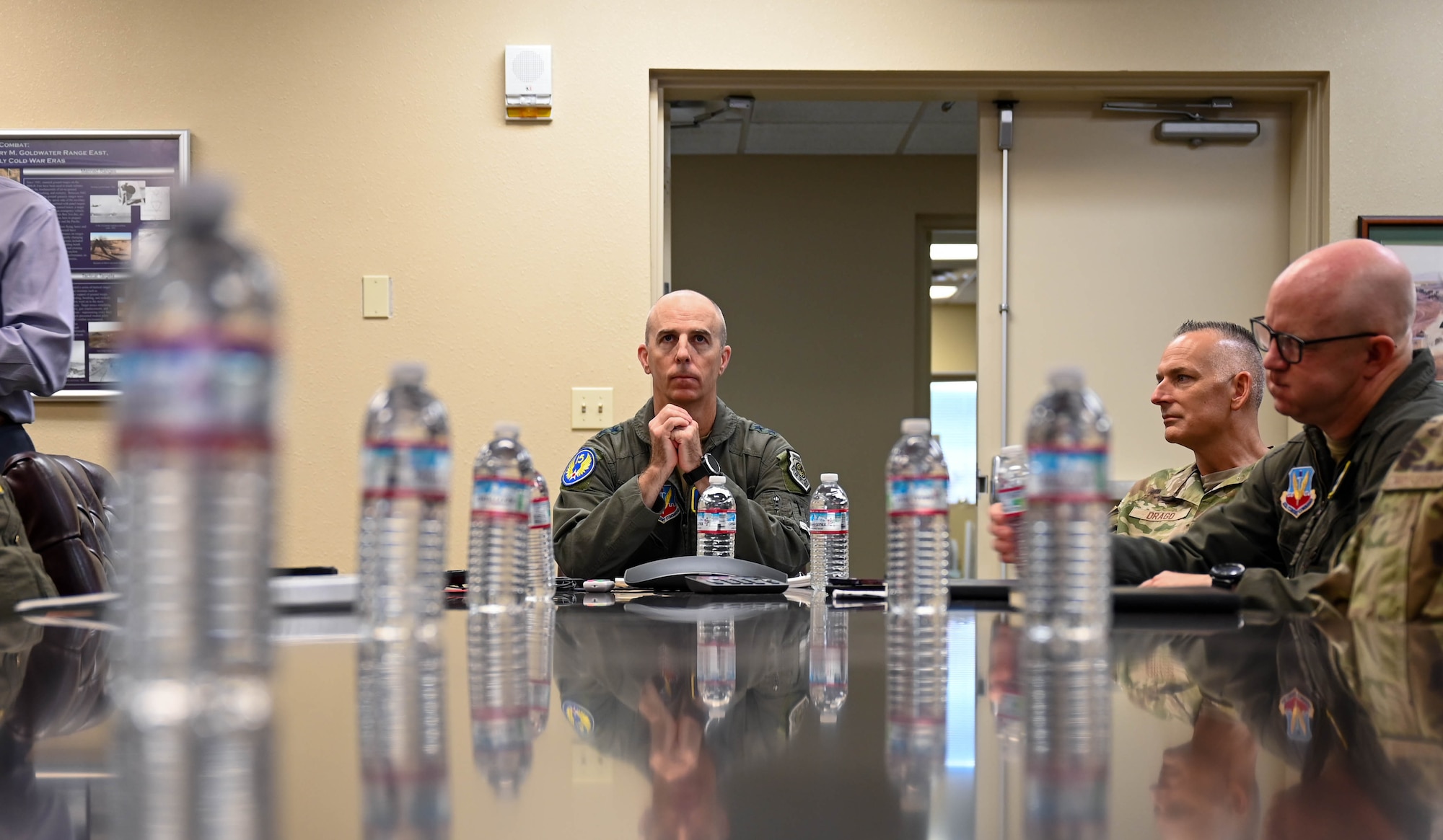 U.S. Air Force Maj. Gen. Steven Behmer, 15th Air Force commander, is briefed by the 56th Range Management Office during a base tour at Luke Air Force Base, Arizona, July 20, 2026.