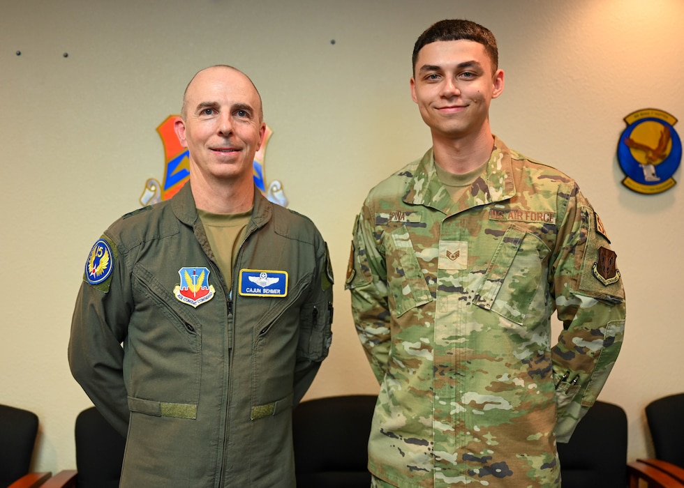 U.S. Air Force Maj. Gen. Steven Behmer, 15th Air Force commander, poses for a photo with Master Sgt. Jose Rosillo, 62nd Fighter Squadron senior enlisted leader, during a base tour at Luke Air Force Base, Arizona, July 20, 2026.