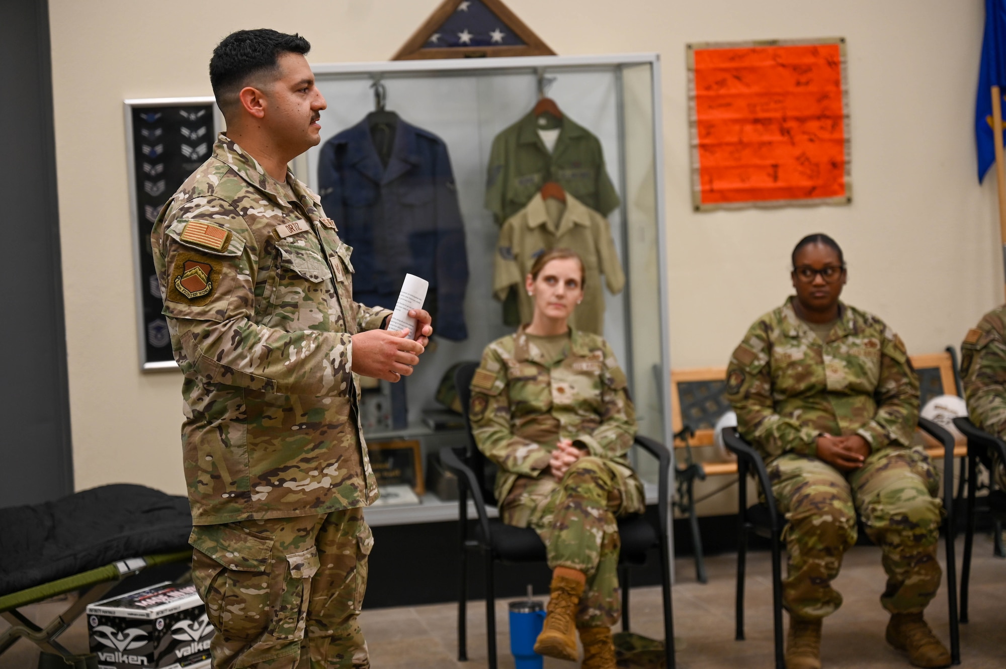 U.S. Air Force Tech. Sgt. Juan Ortiz, 56th Fighter Wing mission ready airmen noncommissioned officer in charge, briefs wing and 15th Air Force command leadership during a base tour at Luke Air Force Base, Arizona, July 20, 2026.