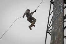 U.S. Army Sgt. Gabriel Kruse, a combat medic assigned to the 807th Theater Medical Command, rappels down a tower during a bilateral rappel training alongside Bangladesh Army soldiers assigned to the 1st Parachute Commando Battalion as a part of Exercise Tiger Lightning 2026 in Bangladesh, July 21, 2026.