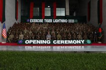Soldiers from U.S. Army Pacific and the Oregon National Guard, along with members of the Bangladesh Army pose for a group photo after the opening ceremony of Tiger Lightning 2026 in Bangladesh, July 19, 2026.