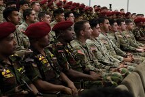 U.S. Army Soldiers of the Oregon Army National Guard and members of the Bangladesh Army watch the opening ceremony for Tiger Lightning 2026 in Bangladesh, July 19, 2026.