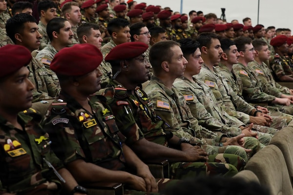 U.S. Army Soldiers of the Oregon Army National Guard and members of the Bangladesh Army watch the opening ceremony for Tiger Lightning 2026 in Bangladesh, July 19, 2026.