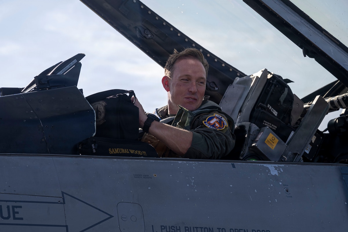 U.S. Air Force Col. Paul Davidson, 35th Fighter Wing commander, prepares to leave an F-16 Fighting Falcon after his final flight at Misawa Air Base, Japan, June 7, 2026. The fini flight commemorated Col. Davidson’s  conclusion of his flying chapter with the 35th Fighter Wing before beginning his next assignment. (U.S. Air Force photo by Senior Airman Patrick Boyle)