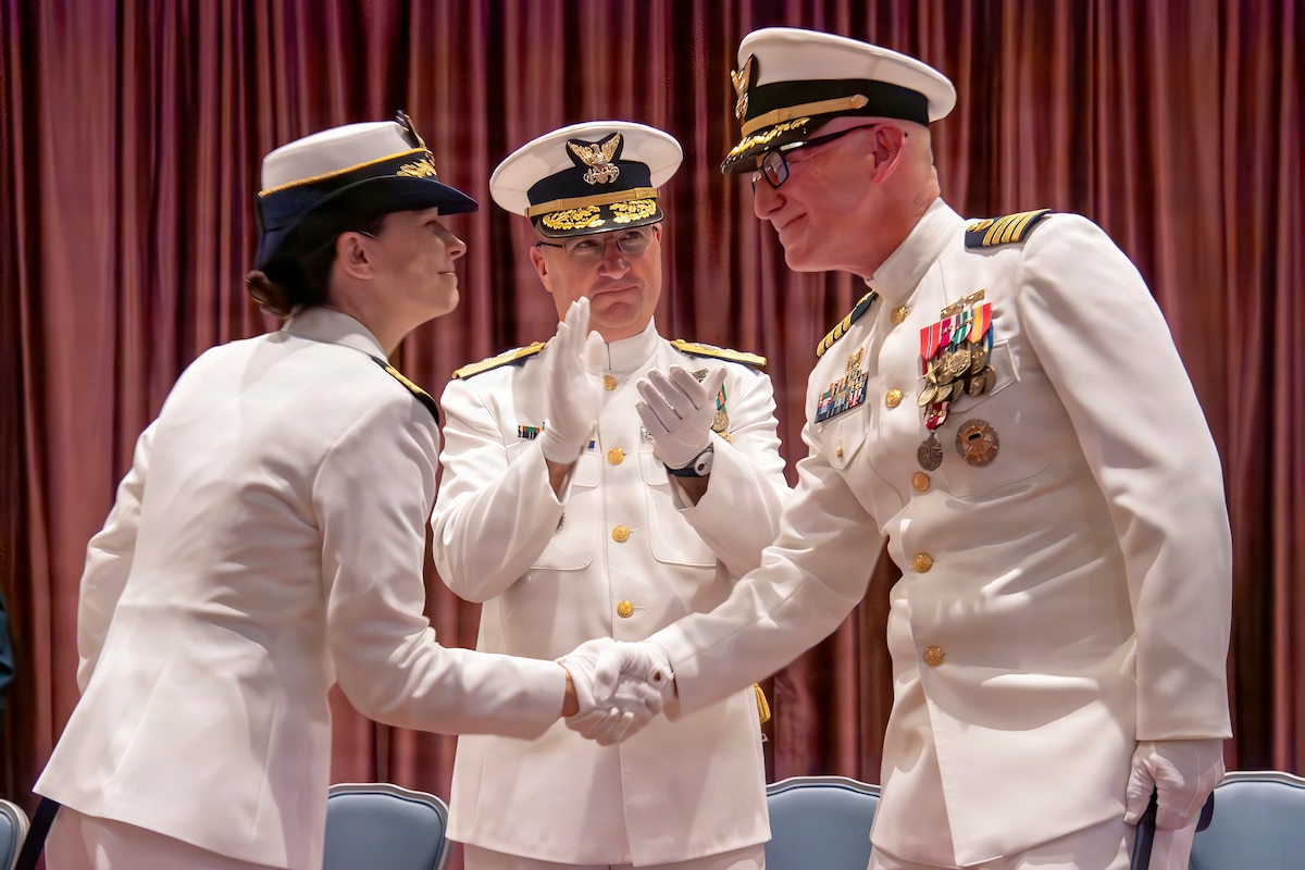 U.S. Coast Guardsmen shake hands