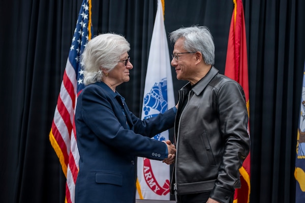 Retired U.S. Navy Vice Adm. Ann E. Rondeau, president of the Naval Postgraduate School (NPS), greets Jensen Huang, founder and CEO of NVIDIA, at NPS in Monterey, California, July 22, 2026. The visit included the commissioning of the NVIDIA DGX GB300 AI supercomputer and a fireside chat with military, academic and industry leaders. (U.S. Navy photo by Mass Communication Specialist 2nd Class Janiel Adames)