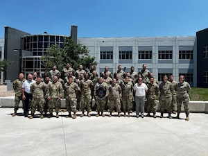 Members of 10th Force Development Squadron, Space Delta 10, pose for a group photo July 2, 2026, at The Aerospace Corporation in Colorado Springs, Colorado.