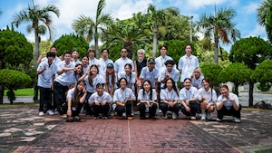 Kadena Language Institute students and teachers pose for a photo at the Ryukyu Islands Surrender Site during a tour at Kadena Air Base, Japan, July 17, 2026.