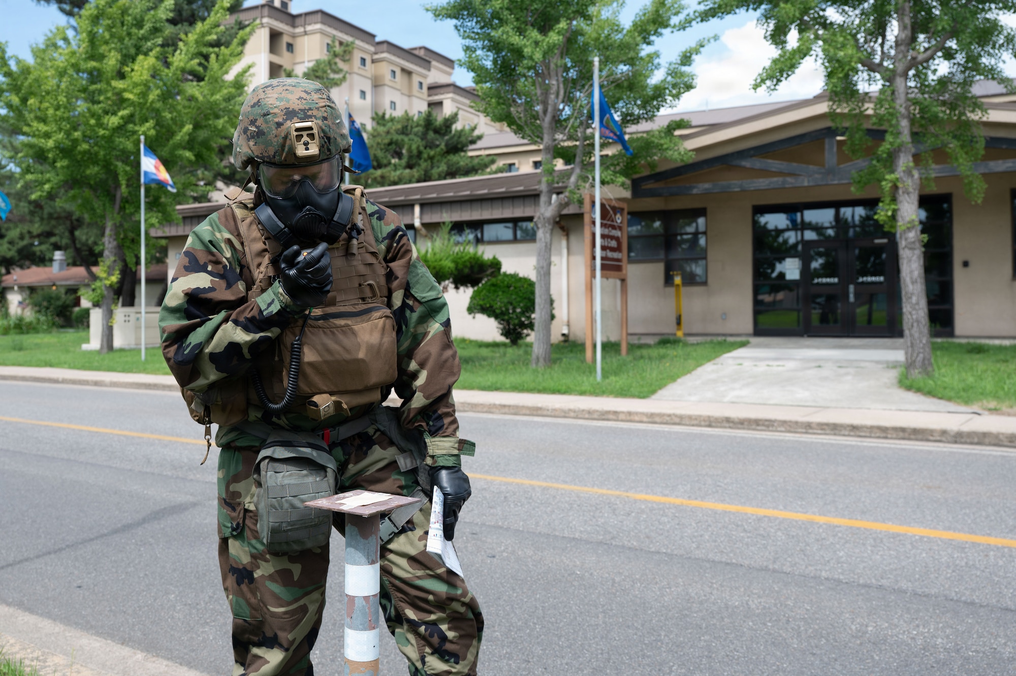 U.S. Marine Lance Cpl. Garrett Bruening, a Chemical, Biological, Radiological and Nuclear responder assigned to Marine Wing Support Squadron 171, Marine Air Station, Iwakuni, Japan, responds to a simulated chemical contamination during exercise Beverly Sentinel 26-4 at Kunsan Air Base, Republic of Korea, July 22, 2026. By integrating directly during realistic training scenarios, Airmen and Marines learned more about each other’s operational capabilities, building strong professional relationships essential for success in joint combat environments.
