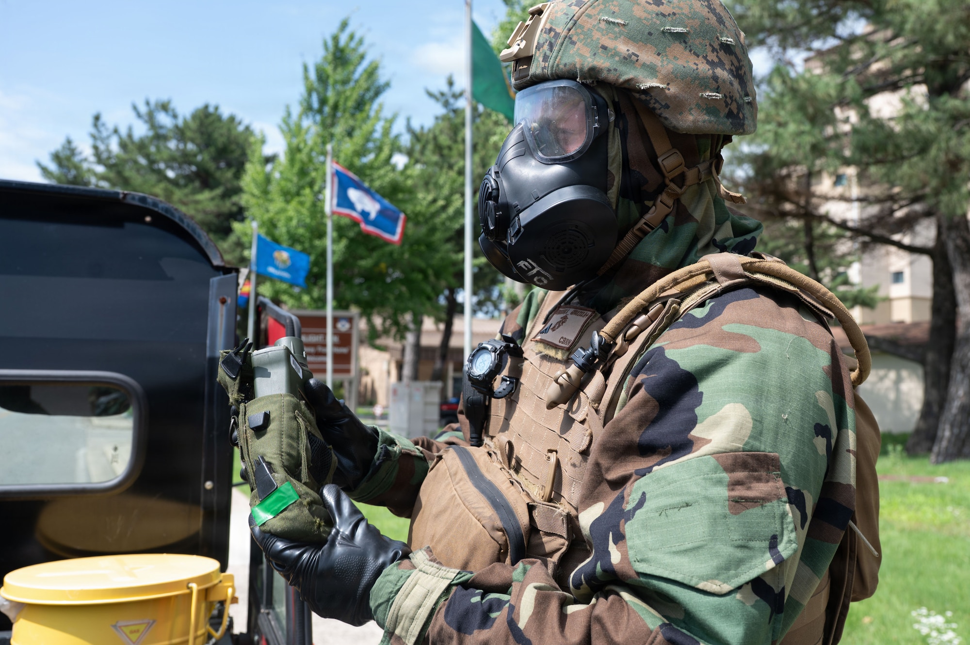U.S. Marine Lance Cpl. Garrett Bruening, a Chemical, Biological, Radiological and Nuclear responder assigned to Marine Wing Support Squadron 171, Marine Air Station, Iwakuni, Japan, inspects a Joint Chemical Agent Detector during exercise Beverly Sentinel 26-4 at Kunsan Air Base, Republic of Korea, July 22, 2026. Joint training during Bev. Sent. 26-4 ensured that U.S. Air Force and Marine Corps air and ground forces maintained proficiency while integrating capabilities that project strength and ensure regional stability.